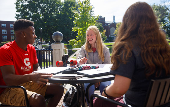 Central students studying outside Maytag Student Center.